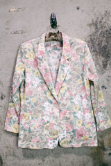 Women's vintage 1980's Elizabeth Williams, Made in USA label long sleeve floral print blazer with one button closure. All over pink, yellow, and tan flowers.