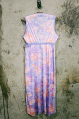 Women's vintage 1980's sleeveless midi length nightie dress in light purple, pink, and peach all over tie dye print. Has lace trim.