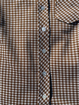 Women's vintage 1970's short sleeve button up shirt blouse in brown and white checkered print polyester material.