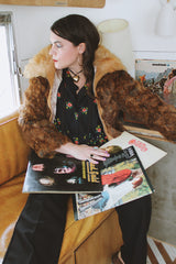 Women's vintage 1980's Dino Ricco, Made in Hong Kong label long sleeve zip up brown genuine fur coat with cream fur neckline.