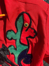 Women's vintage 1980's Dawn Joy Fashions label long sleeve double breasted red blazer with velvet lizards on it.