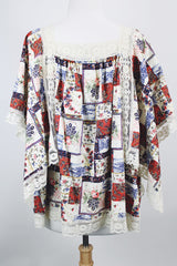 Women's vintage 1980's Lane Bryant label flutter sleeve blouse with cream lace trim and a square neckline. All over multicolored patchwork print.