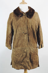 Women's vintage 1960's Emerald Fine Fashions label 3/4 arm length long tan suede mod style jacket with genuine fur trim around neck.