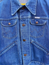 Women's vintage 1970's Wrangler, Made in USA long sleeve button up medium wash denim jacket with brass hardware and pockets.