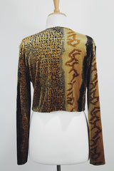 Women's vintage 1990's High Drama label long sleeve cropped fit open front velvet top with an all over black and gold snakeskin print.