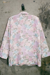 Women's vintage 1980's Sag Harbor label long sleeve lightweight floral print blazer with one gold button closure. White with pink and blue flowers.