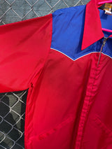 Women's or men's vintage 1970's Swingster, World of Wearables label long sleeve blue and red lightweight zip up windbreaker with a western style.