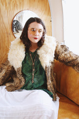 Women's vintage 1970's Dino Ricco, Made in Hong Kong label Penny Lane long sleeve genuine fur coat with a brown body and big cream fur trim on neck.