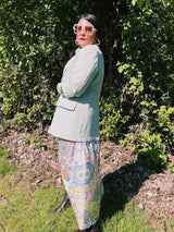 Women's or men's vintage 1970's JCPenny label long sleeve blazer in polyester material. Has a all over light green and white houndstooth print.