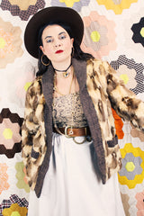 Women's vintage 1960's Hopper Furs, St. Louis label long sleeve open front cardigan jacket with all over patchwork multicolored fur and a rib knit trim.