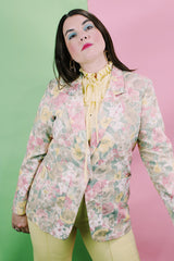 Women's vintage 1980's Elizabeth Williams, Made in USA label long sleeve floral print blazer with one button closure. All over pink, yellow, and tan flowers.