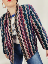 Women's vintage 1980's Graff Petite, Made In USA label long sleeve open front nubby acrylic cardigan sweater with a multicolored zig zag print.