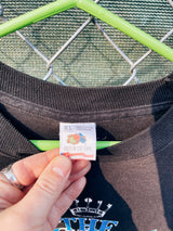 Men's or women's vintage 1992 Fruit of the Loom, Made in the USA label short sleeve black band t-shirt with white graphic on the front and back of The Mood Blues at Red Rocks, Colorado.