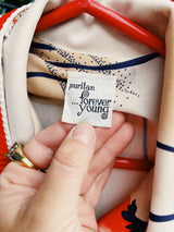 Women's vintage 1970's Puritan Forever Young label matching set. Short sleeve midi length dress and matching long sleeve open front cardigan in polyester. Cream with all over red floral print.