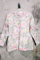 Women's vintage 1980's Elizabeth Williams, Made in USA label long sleeve floral print blazer with one button closure. All over pink, yellow, and tan flowers.