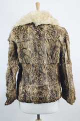 Women's vintage 1970's Dino Ricco, Made in Hong Kong label Penny Lane long sleeve genuine fur coat with a brown body and big cream fur trim on neck.