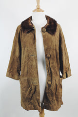 Women's vintage 1960's Emerald Fine Fashions label 3/4 arm length long tan suede mod style jacket with genuine fur trim around neck.