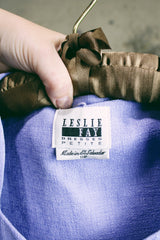 Women's vintage 1990's Leslie Fay - Dresses Petite label long sleeve lavender purple button up blazer with black buttons and scalloped trim edges.