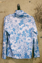 Women's vintage 1970's Graff Californiawear label long sleeve top with a cowl neck and all over blue floral print.