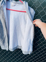 Women's or men's vintage 1980's Gearing Up label Large sleeveless heather grey zip up hoodie with silver zipper and two front pockets.