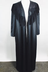 Women's vintage 1990's Blanche label long sleeve maxi length black wrap duster robe. Has lace and ruffle trim. Lightweight Polyester material.
