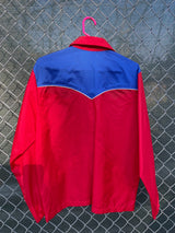 Women's or men's vintage 1970's Swingster, World of Wearables label long sleeve blue and red lightweight zip up windbreaker with a western style.