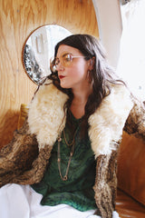 Women's vintage 1970's Dino Ricco, Made in Hong Kong label Penny Lane long sleeve genuine fur coat with a brown body and big cream fur trim on neck.