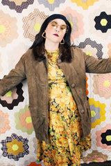 Women's vintage 1960's Emerald Fine Fashions label 3/4 arm length long tan suede mod style jacket with genuine fur trim around neck.