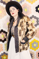 Women's vintage 1960's Hopper Furs, St. Louis label long sleeve open front cardigan jacket with all over patchwork multicolored fur and a rib knit trim.