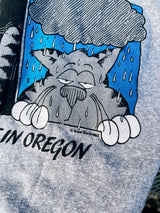 Women's or men's vintage 1983 Super Shirts, Made in USA label Medium short sleeve heather grey t-shirt with cartoon cat graphic on the front in blue, black, and white.