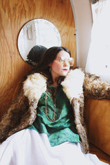 Women's vintage 1970's Dino Ricco, Made in Hong Kong label Penny Lane long sleeve genuine fur coat with a brown body and big cream fur trim on neck.