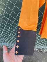 Men's vintage 1930's/1940's Town Talk Menswear label long sleeve orange and white button up western style cowboy shirt.