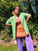 Women's vintage 1980's Sag Harbor label short sleeve lightweight lime green blazer with a one button closure. Rayon and Polyester material, perfect for Summer.