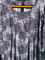 Women's vintage 1970's short length short sleeve grey printed dress with big bell sleeves in a cotton material.