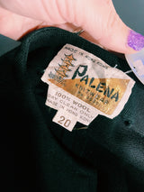 Women's vintage 1970's Palena Knitwear, Made in Hong Kong label sleeveless black wool vest with brass buckles closures up the front and floral trim details.