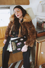 Women's vintage 1980's Dino Ricco, Made in Hong Kong label long sleeve zip up brown genuine fur coat with cream fur neckline.