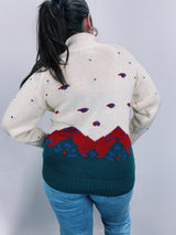 long sleeve cream pullover sweater with collar and mountain print