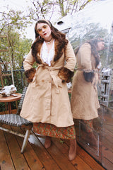 Women's vintage 1970's Domino, New York label long sleeve knee length light tan camel colored wool coat with brown genuine fur trim around collar and cuffs.