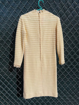 Women's vintage 1970's Maggi label long sleeve short length cream colored crochet dress with lace trim and mock neck.
