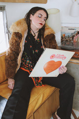 Women's vintage 1980's Dino Ricco, Made in Hong Kong label long sleeve zip up brown genuine fur coat with cream fur neckline.