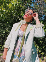 Women's or men's vintage 1970's JCPenny label long sleeve blazer in polyester material. Has a all over light green and white houndstooth print.