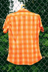 Women's or men's vintage Y2k Mediterranea, Made in Italy label short sleeve button. up shirt with an all over vibrant orange print.