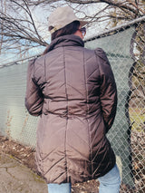 brown long puffy jacket