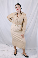Women's or mens' vintage 1970's long sleeve button up shirt in a slinky nylon tan colored material. White buttons and dagger collar.