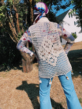 sleeveless cream crochet vest with beaded trim details vintage 1970's