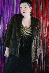 Women's vintage 1960's Fur Salon, M & T label long sleeve dark brown real fur evening jacket. No front closure, two side pockets and fully lined.
