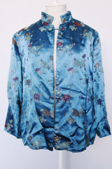 Women's vintage 1960's long sleeve vibrant blue satin robe jacket with a mandarin collar and overall ditsy print.