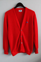 Women's or men's vintage 1980's Izod Lacoste label long sleeve bright red colored button up cardigan sweater with small alligator patch on left chest.