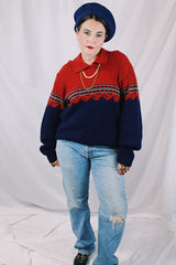 Men's or women's vintage 1970's Kingsport label long sleeve pullover sweater in burnt orange and navy. Built on matching collar. Soft acrylic material.