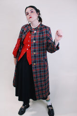 Women's vintage 1960's long label long length plaid tartan print jacket in black and red with gold buttons. Fully lined and has side pockets.